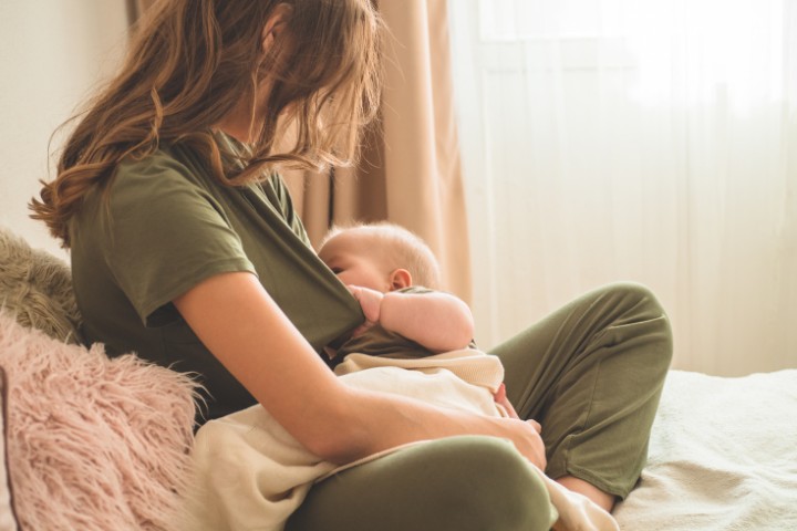 Breastfeeding mother and baby in a quiet room