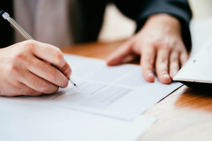 Filling out autism spectrum testing questionnaire during evaluation