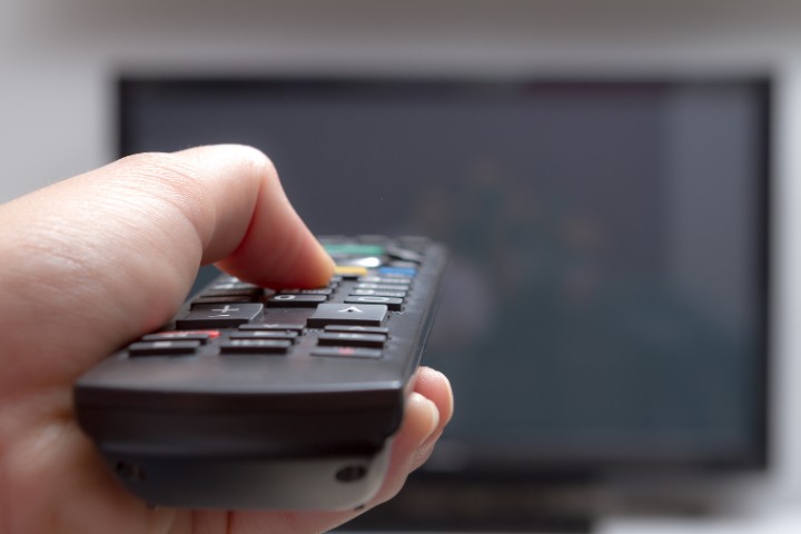 Turning off television to create a quiet environment for newborn communication