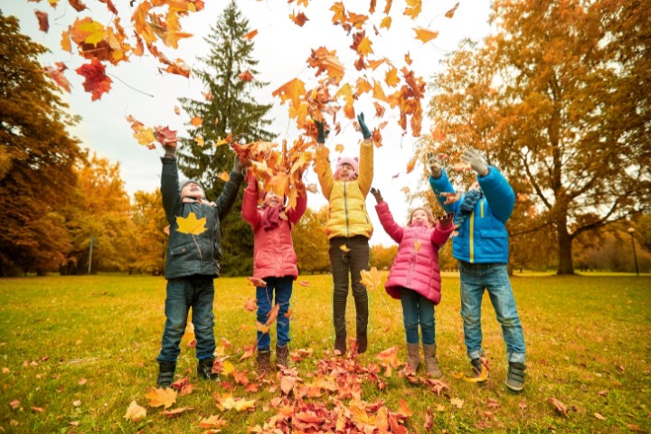 Kids enjoying outdoor activities in fall safely with flu shots for protection