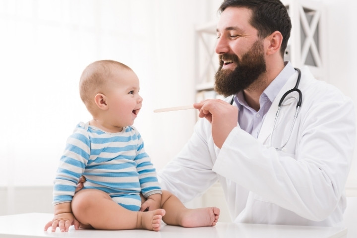 Dallas Pediatric ENT assessing a baby’s tongue tie before recommending a lingual frenectomy procedure