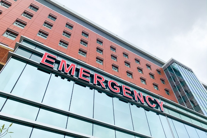 Hospital emergency room sign representing when a child needs ER care vs a clinic visit