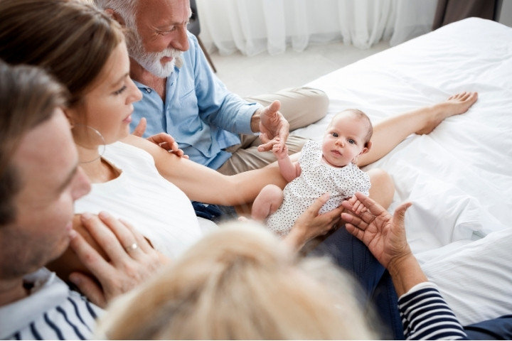 Family discussing next steps after newborn hearing screening