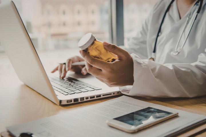 Pediatrician providing medication guidance after virtual pediatric care